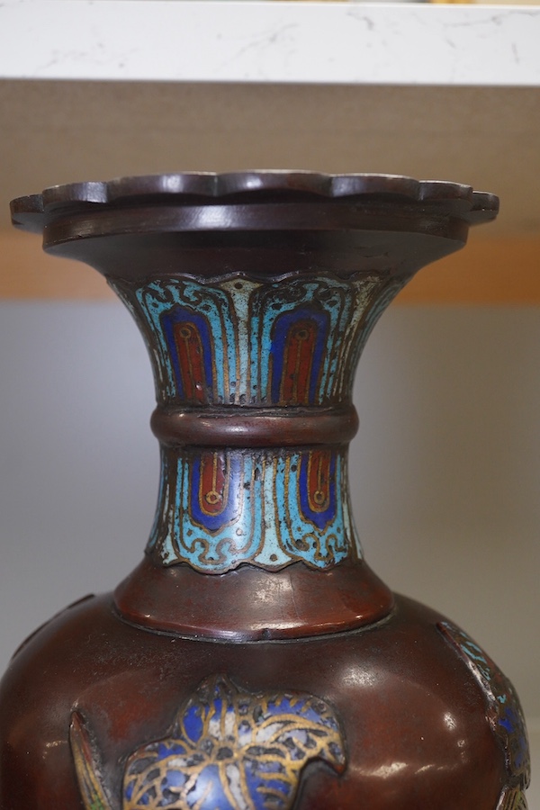 A Japanese bronze and champlevé enamel vase, decorated with irises, 30.5cm high. Condition - fair.